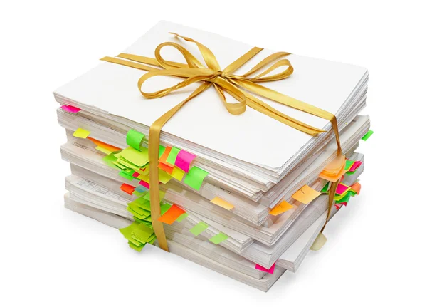 Pack of documents tied up by a gold ribbon — Stock Photo, Image