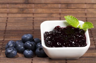 Blueberry jam and blueberries clipart