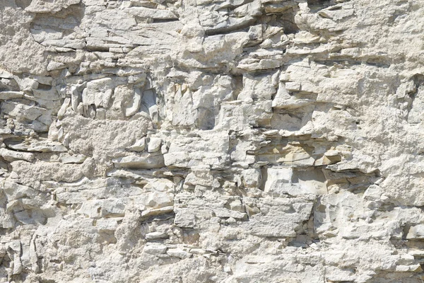 Fondo irregular pared de piedra blanca — Foto de Stock