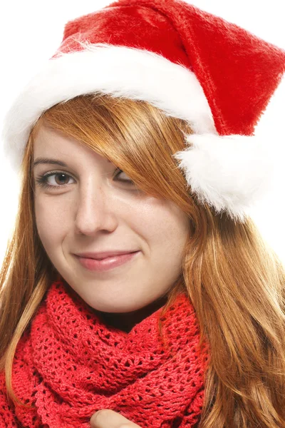 Sorridente rossa giovane donna con cappello di Babbo Natale — Foto Stock