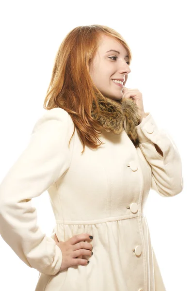 Jonge lachende vrouw in Fauve winterjas — Stockfoto