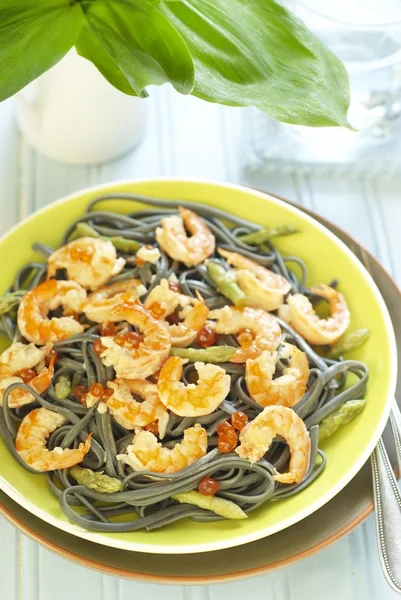stock image Pasta with shrimps, red caviar and asparagus