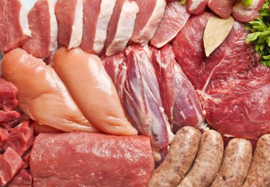 Ingredient's of fresh meat ready to cook on barbecue - backgrou clipart