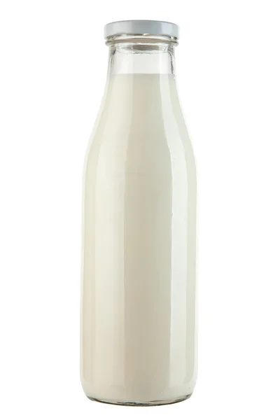 Бутылка с молоком на белом фоне — стоковое фото