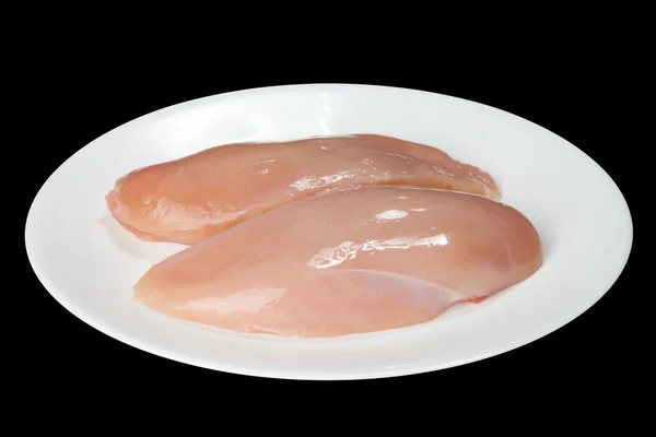 Куриное филе на белой тарелке — стоковое фото