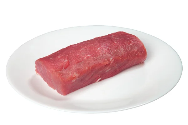 Pedaços de carne crua em um prato branco — Fotografia de Stock
