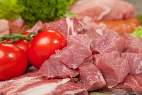Frisches rohes Fleisch Hintergrund mit Rindfleisch, Pute und Hackfleisch — Stockfoto