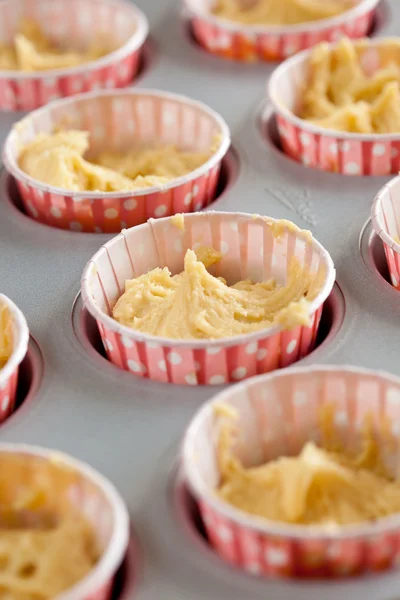 Dough in cupcake tins — Stock Photo, Image