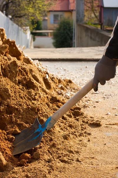 stock image Worker and building sand