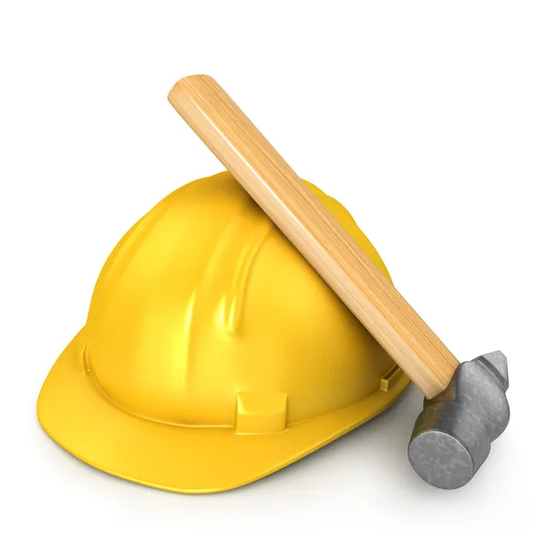 Nuevo casco amarillo con martillo — Foto de Stock