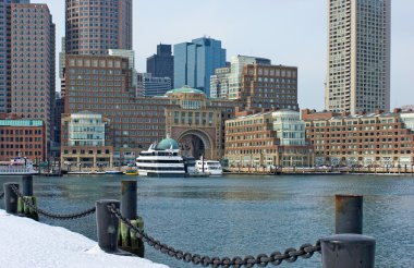 Rowes wharf with ships in boston massachusetts clipart