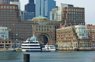 Rowes wharf with ships in south boston massachusetts clipart
