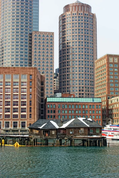 Boston skyscrapers above old fishing shacks — Stock Photo, Image