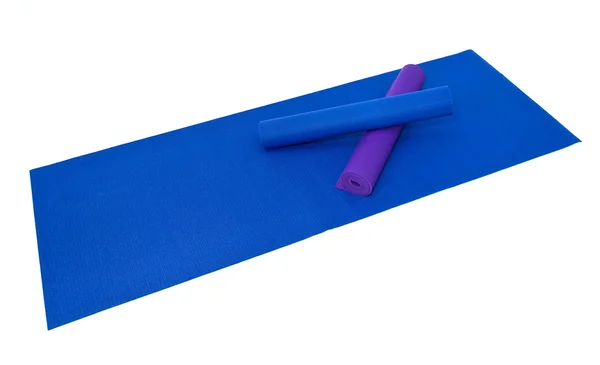 Yoga exercise mats on white — Stock Photo, Image