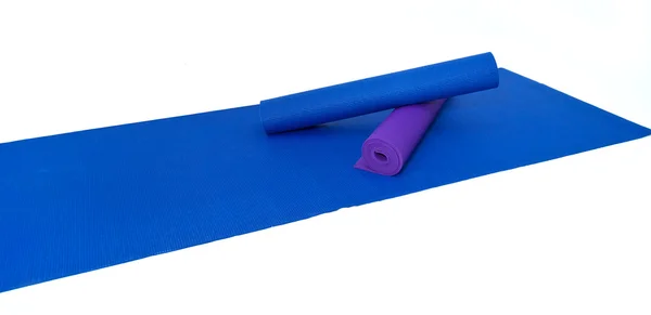 Three yoga exercise mats on white — Stock Photo, Image