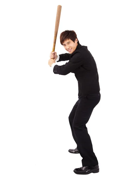 Giovane e fiducioso uomo d'affari in possesso di una mazza da baseball che si prepara a colpire — Foto Stock