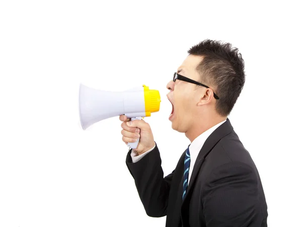 Jonge zakenman maken lawaai door megafoon — Stockfoto