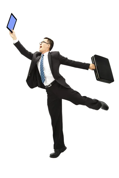 Feliz hombre de negocios celebración de la tableta PC y maletín —  Fotos de Stock