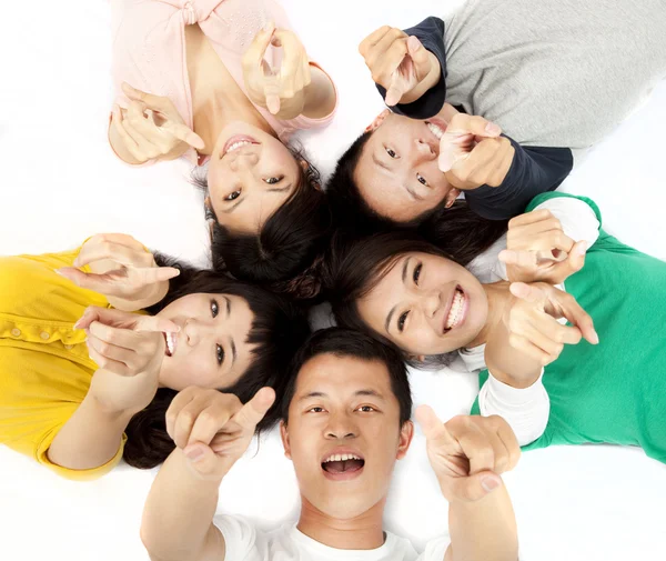 Happy asian young group pointing at you Royalty Free Stock Images