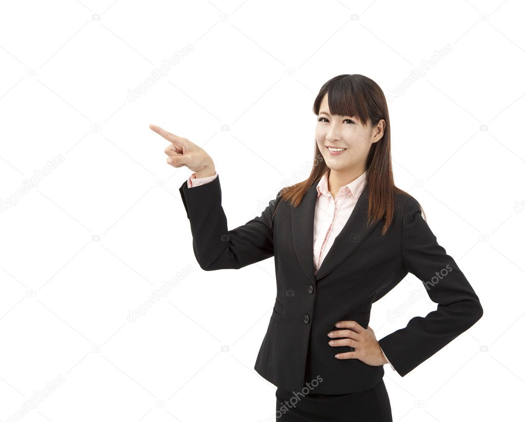 Businesswoman pointing and Isolated on white