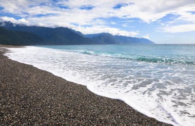 Chihsingtan Beach and gravel in taiwan clipart