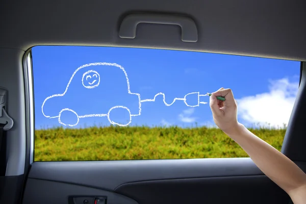 Χέρι σχεδίασης ηλεκτρικό αυτοκίνητο έννοια για τα παράθυρα των αυτοκινήτων — Φωτογραφία Αρχείου