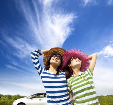 Happy young woman enjoy vacation on road trip clipart