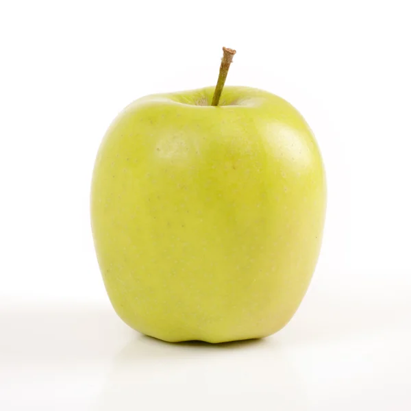 Зеленое яблоко выделено на белом Стоковая Картинка