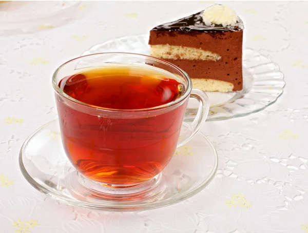 Xícara de chá e fatias de bolo — Fotografia de Stock