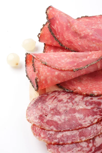 Varmvalsade skinka och salami — Stockfoto