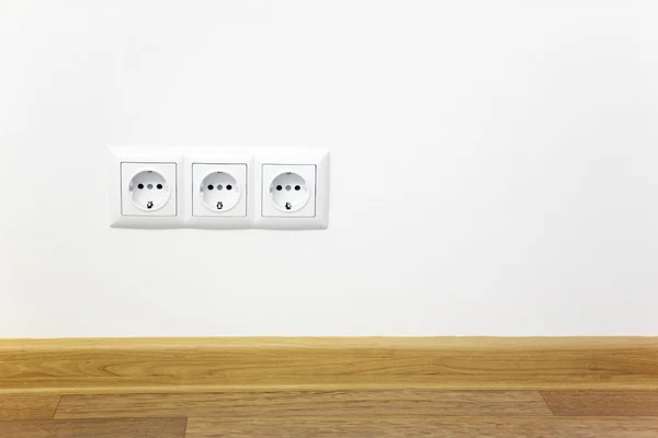 Empty interior white wall with power outlet — Stock Photo, Image