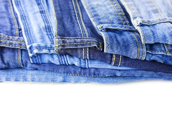 Rolls of Blue Jeans diisolasi pada latar belakang putih — Stok Foto