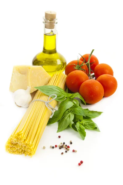 Ingredients for Italian cooking: olive oil, basil, tomato, parme — Stock Photo, Image
