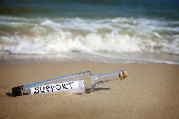Meddelande i en flaska / Support — Stockfoto