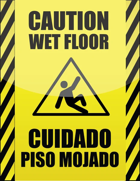 Signo de suelo húmedo en inglés y español — Foto de Stock