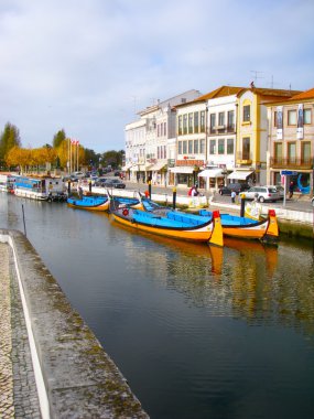 The panorama of Aveiro city and canal with boats clipart