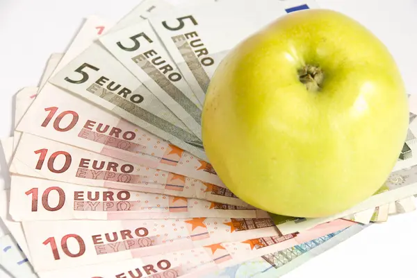 stock image Apple and euro money