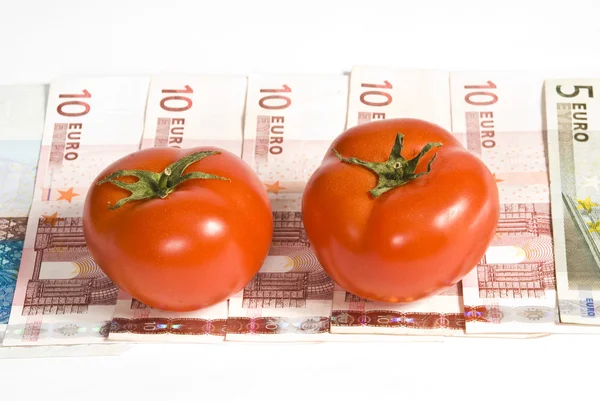 stock image Tomatoes and euro money