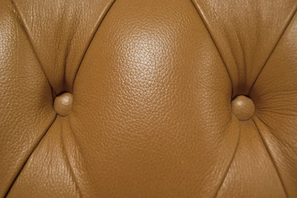 Textura de tapicería de cuero genuino marrón. primer plano — Foto de Stock