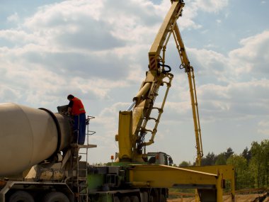 Pouring concrete during construction of the A1 motorway clipart