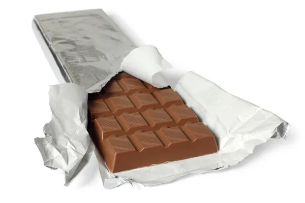Chocolate bar with torn wrapper — Stock Photo, Image
