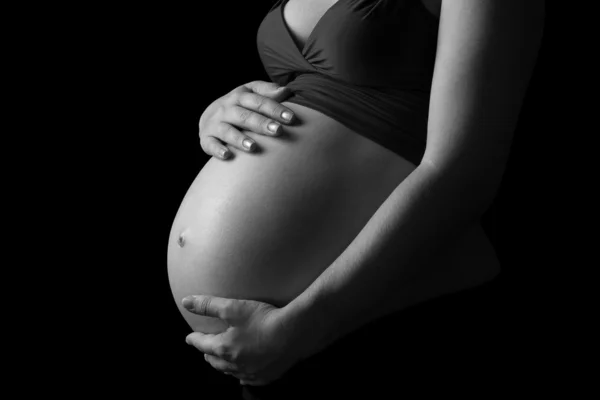 Těhotná žena černé a bílé — Stock fotografie