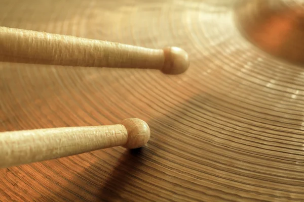 Cymbal and drumsticks — Stock Photo, Image