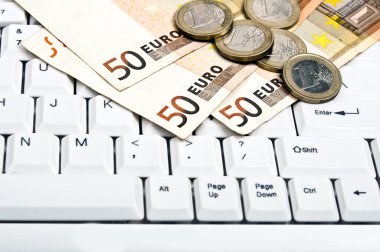 Money on keyboard clipart