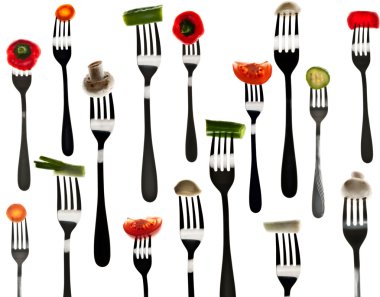 Many slice of vegetables in forks clipart