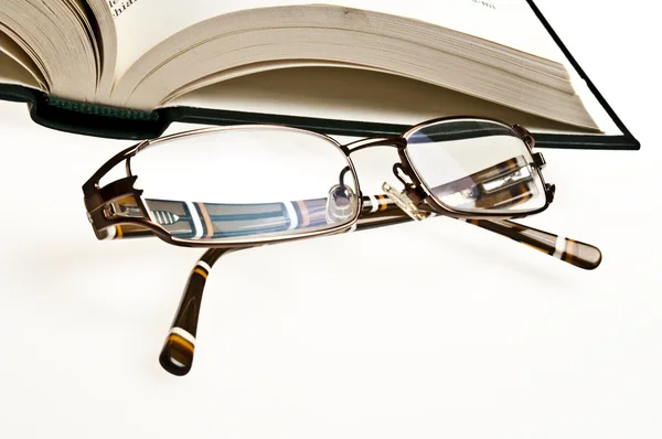 stock image Book and eyeglasses