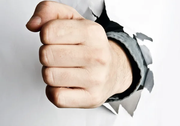 Stock image Fist broke paper