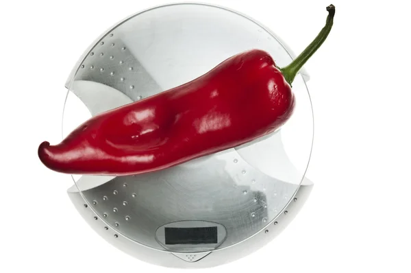 Rode peper op voedsel schaal — Stockfoto
