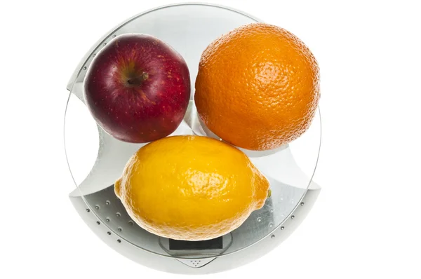 stock image Mix of fruits on food scale