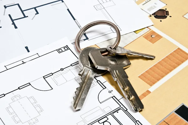 Huis plannen en sleutel — Stockfoto